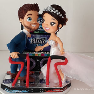 Custom pump it up arcade wedding cake topper
