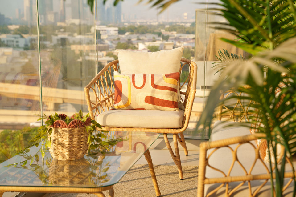 Wide living-and-dining view showing cohesive warm-neutral palette at Vida Downtown