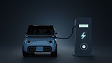 Blue electric car plugged into charging station