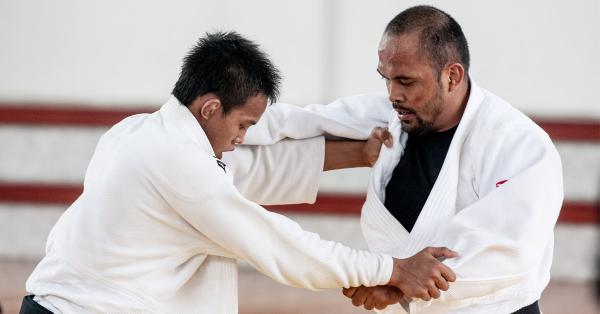 Krisna Bayu (kanan) saat masih berlaga mewakili Indonesia di SEA Games 2011 (Foto: Fernando Randy/HISTORIA)