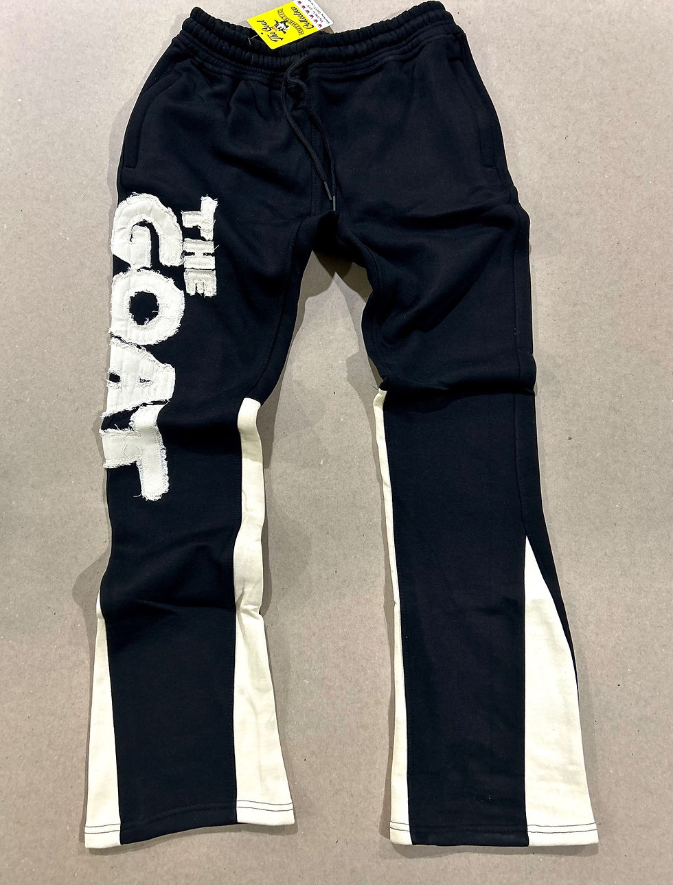 Thumbnail: The G.O.A.T “ The Great Ali” Black & Ivory sweat pants