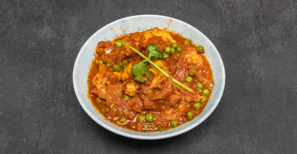 Cauliflower & Green Peas Curry cooked in a Indian Traditional style served by Kausndi Indian Takeout