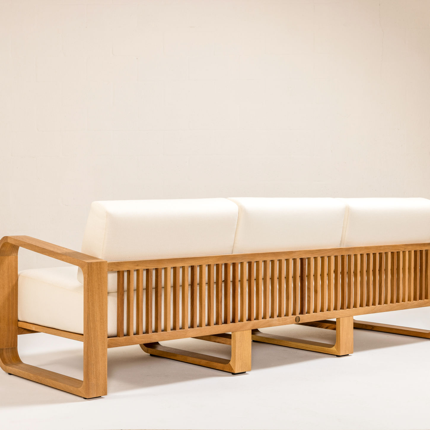 NUWA Collection by Shana Willinsky for CMA Furnishings featuring minimalist outdoor furniture with clean lines, soft proportions, and natural materials designed to harmonize with architectural spaces.