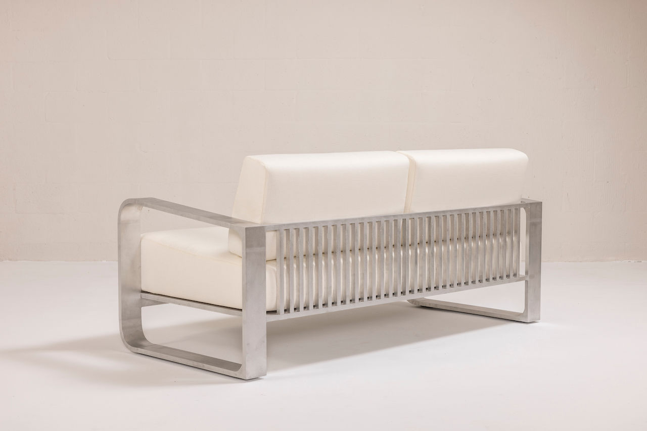 NUWA Collection by Shana Willinsky for CMA Furnishings featuring minimalist outdoor furniture with clean lines, soft proportions, and natural materials designed to harmonize with architectural spaces.