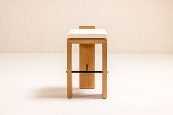 ARÉ Collection by Cristina Recio crafted from solid Iroko wood, featuring minimalist outdoor furniture with clean lines, natural materials, and architectural form.