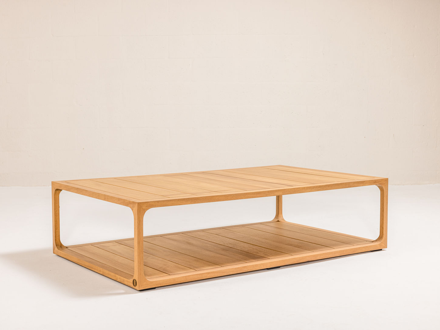 NUWA Collection by Shana Willinsky for CMA Furnishings featuring minimalist outdoor furniture with clean lines, soft proportions, and natural materials designed to harmonize with architectural spaces.