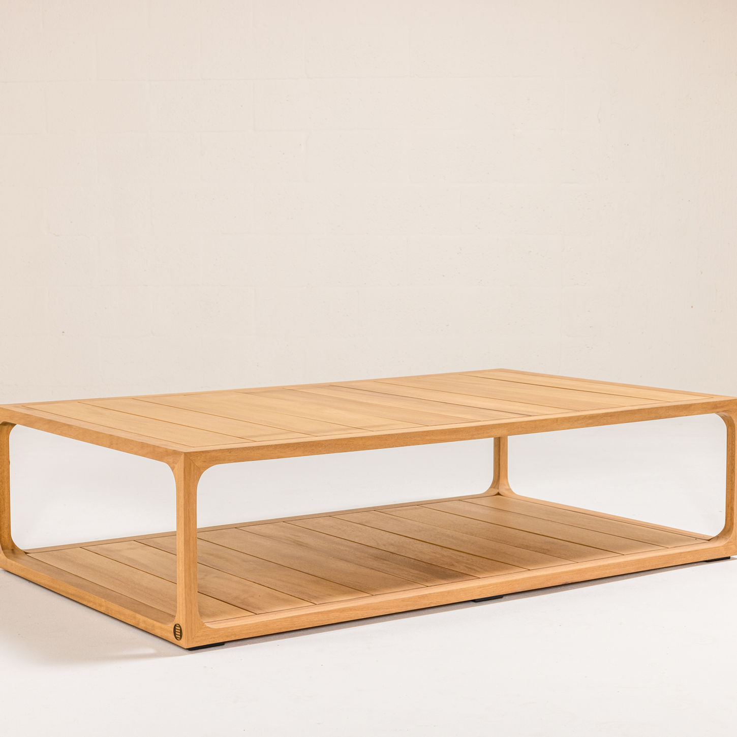 NUWA Collection by Shana Willinsky for CMA Furnishings featuring minimalist outdoor furniture with clean lines, soft proportions, and natural materials designed to harmonize with architectural spaces.