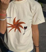 Vintage brandmark on a white t-shirt, apparel design for a founder-led brand