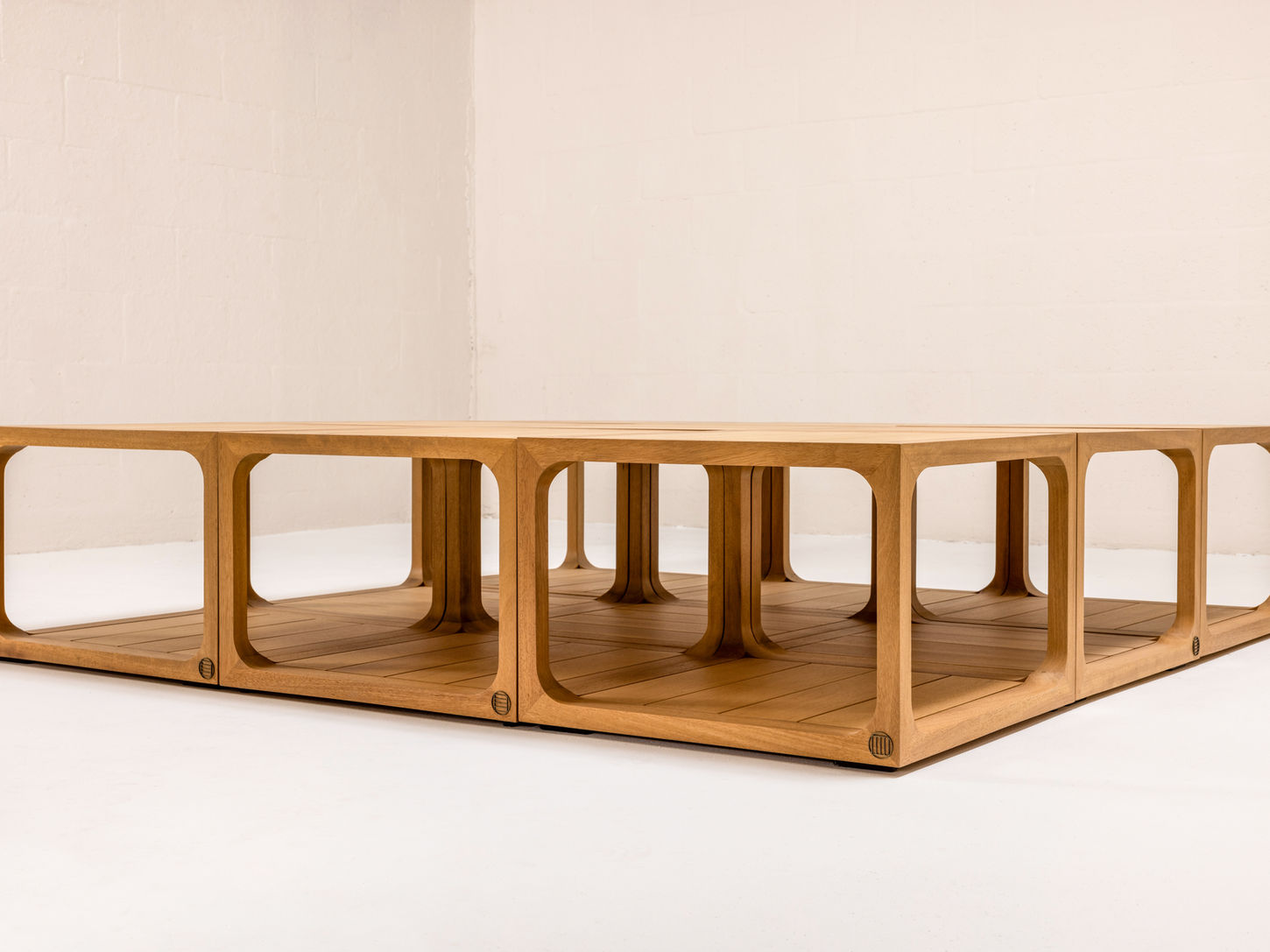 NUWA Collection by Shana Willinsky for CMA Furnishings featuring minimalist outdoor furniture with clean lines, soft proportions, and natural materials designed to harmonize with architectural spaces.