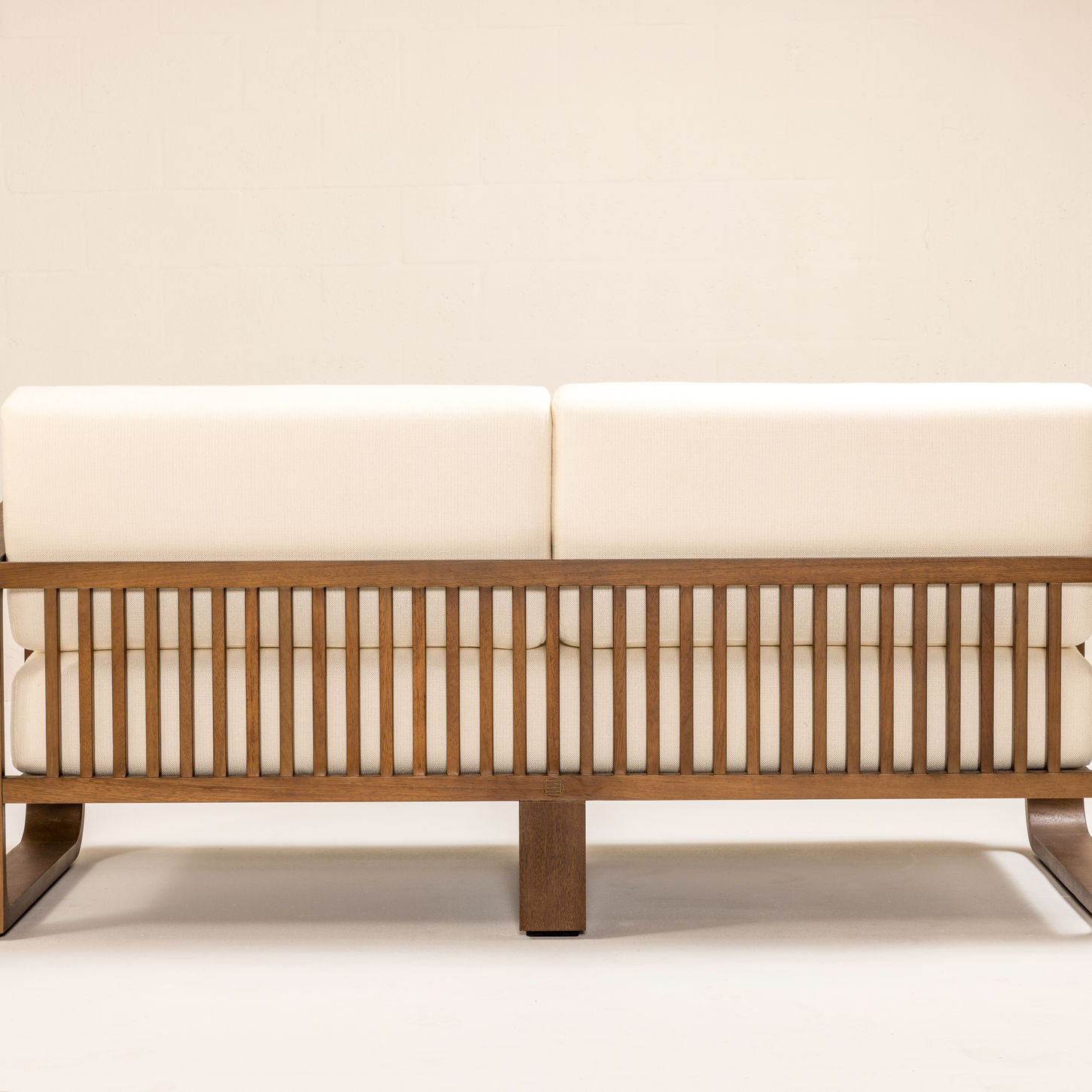 NUWA Collection by Shana Willinsky for CMA Furnishings featuring minimalist outdoor furniture with clean lines, soft proportions, and natural materials designed to harmonize with architectural spaces.