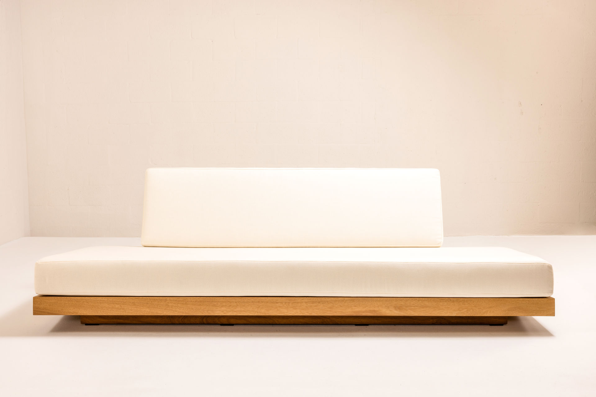 ARÉ Collection by Cristina Recio crafted from solid Iroko wood, featuring minimalist outdoor furniture with clean lines, natural materials, and architectural form.