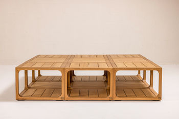 NUWA Collection by Shana Willinsky for CMA Furnishings featuring minimalist outdoor furniture with clean lines, soft proportions, and natural materials designed to harmonize with architectural spaces.