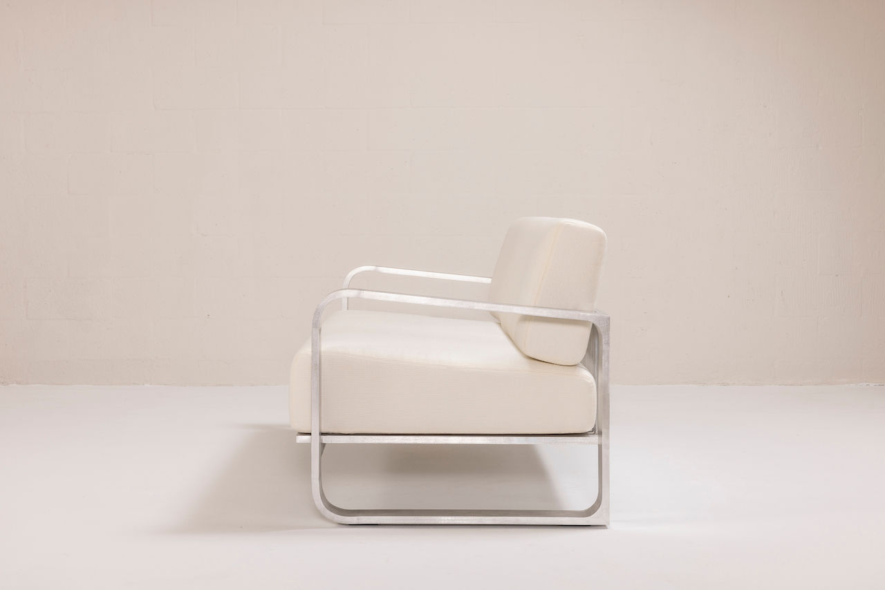 NUWA Collection by Shana Willinsky for CMA Furnishings featuring minimalist outdoor furniture with clean lines, soft proportions, and natural materials designed to harmonize with architectural spaces.