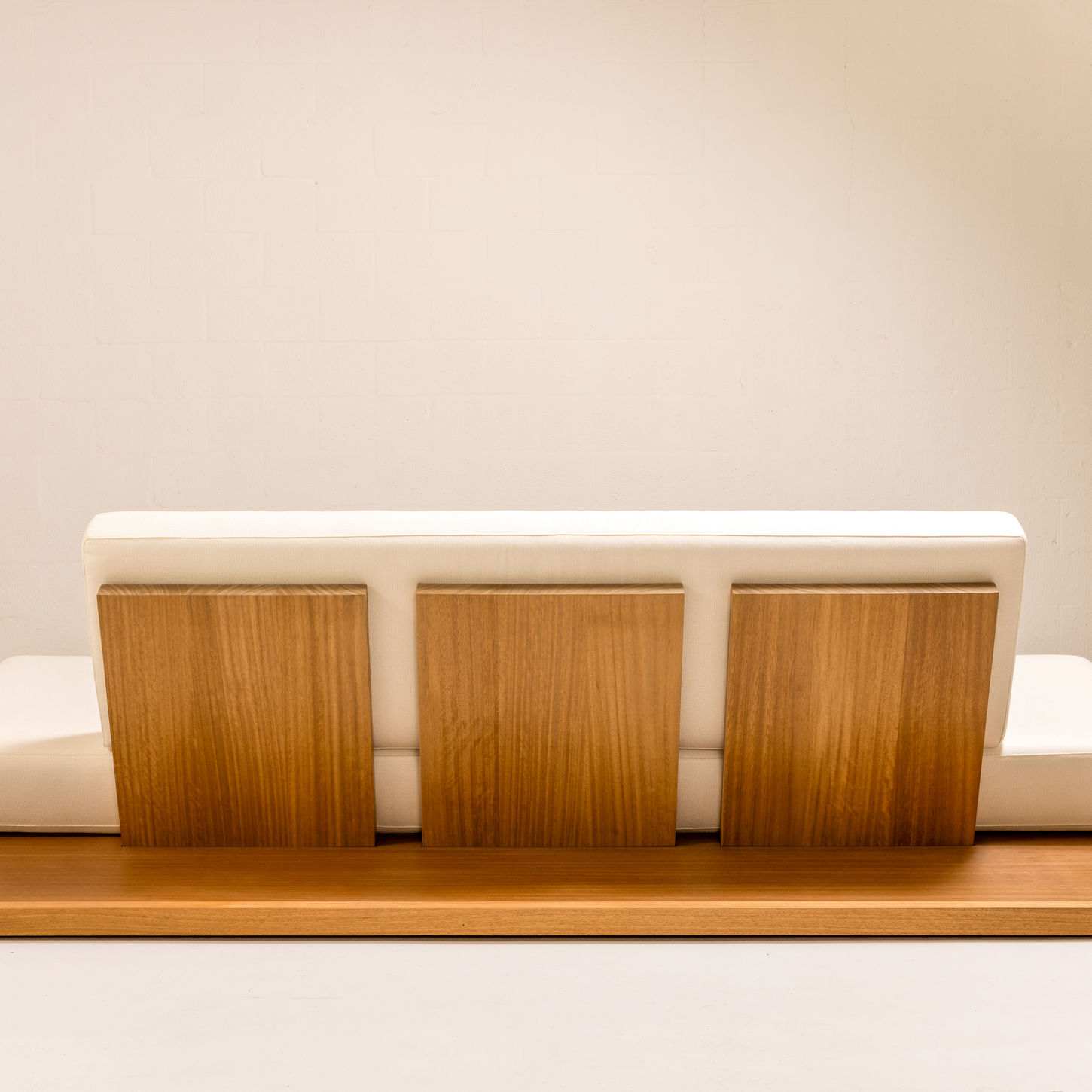 ARÉ Collection by Cristina Recio crafted from solid Iroko wood, featuring minimalist outdoor furniture with clean lines, natural materials, and architectural form.