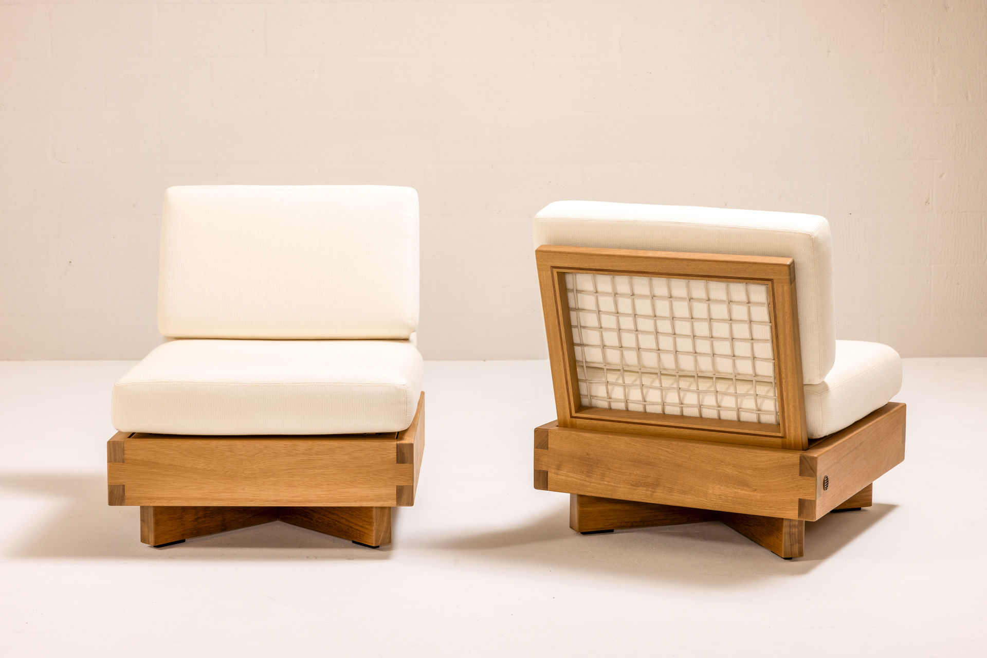 DI LIDO Collection by Studio JAC featuring modern outdoor furniture crafted from solid Iroko, with woven rope detailing, low-slung profiles, and architectural form designed for relaxed outdoor living.