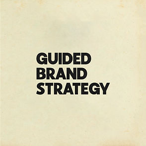 GUIDED BRAND STRATEGY TEXT OVER WHITE BACKGROUND