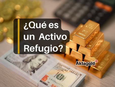 Barras de oro, dolares y una calculadora