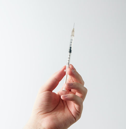 a person holding a needle_edited_edited.jpg