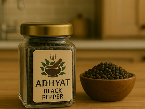 Adhyat Pepper whole black peppercorns in a glass jar, hand-harvested from Araku Valley and naturally sun-cured.