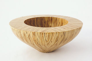west coast gallery piha auckland art exhibition artist ian lambert wood carver