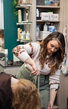 Caitlyn Cayea, an intuitive Syracuse, NY hairstylist