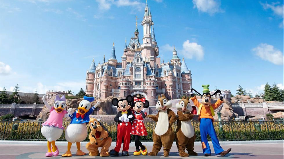Disney characters posing happily in front of a castle under a clear blue sky. Bright costumes, cheerful mood, iconic fairytale setting.