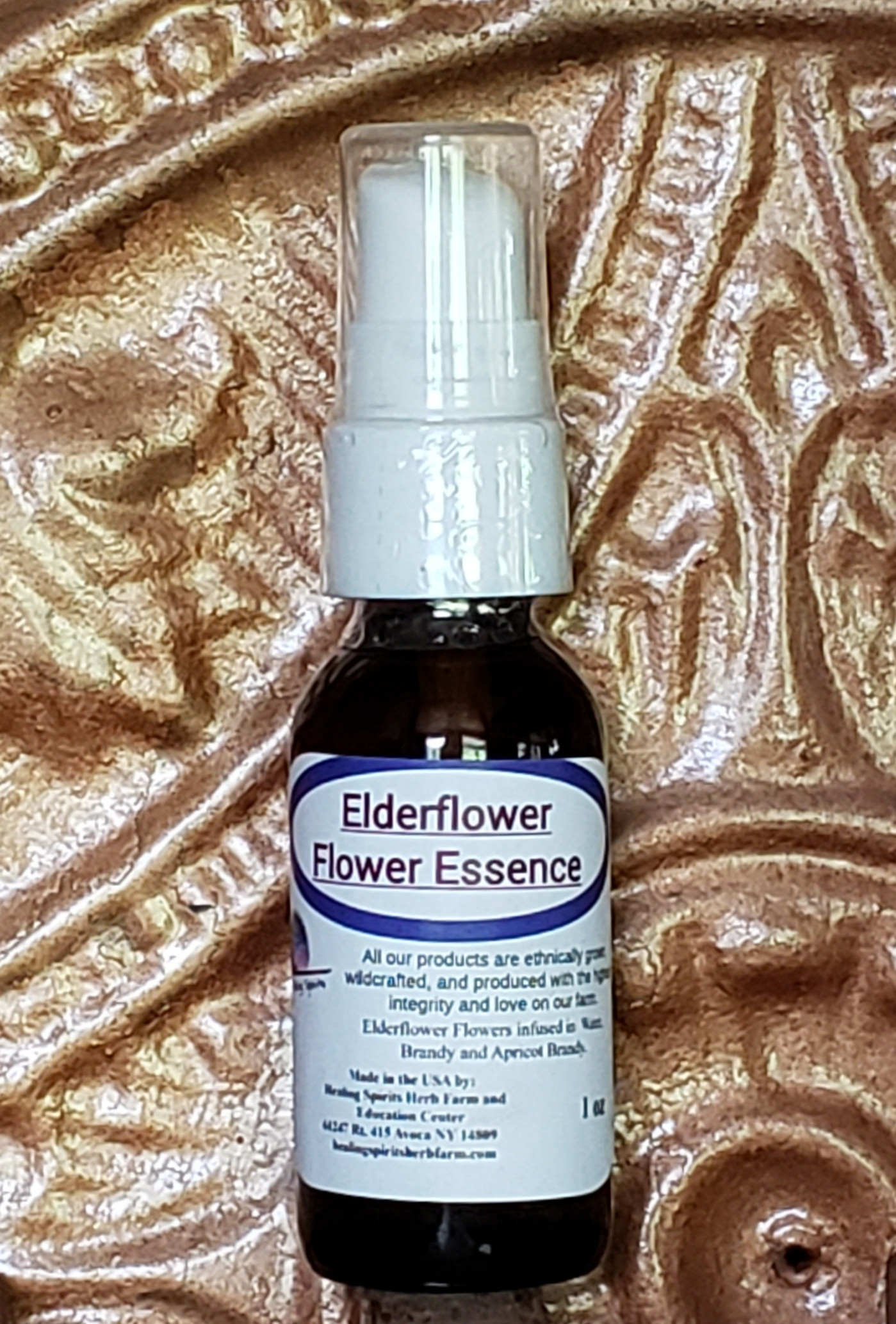 Elderflower Flower Essence bottle standing tall.