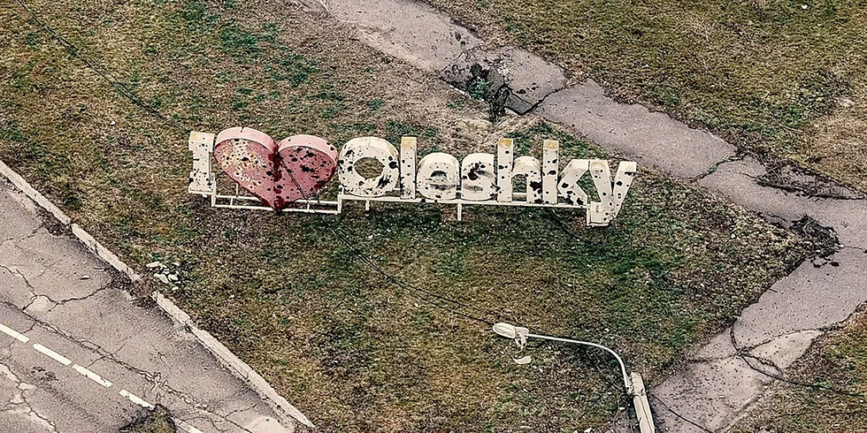 An "I Love Oleshky" sign pockmarked by shrapnel and bullet holes. 34th Separate Marine Brigade (Photo: "Borysfen" / facebook.com/34obrmp)
