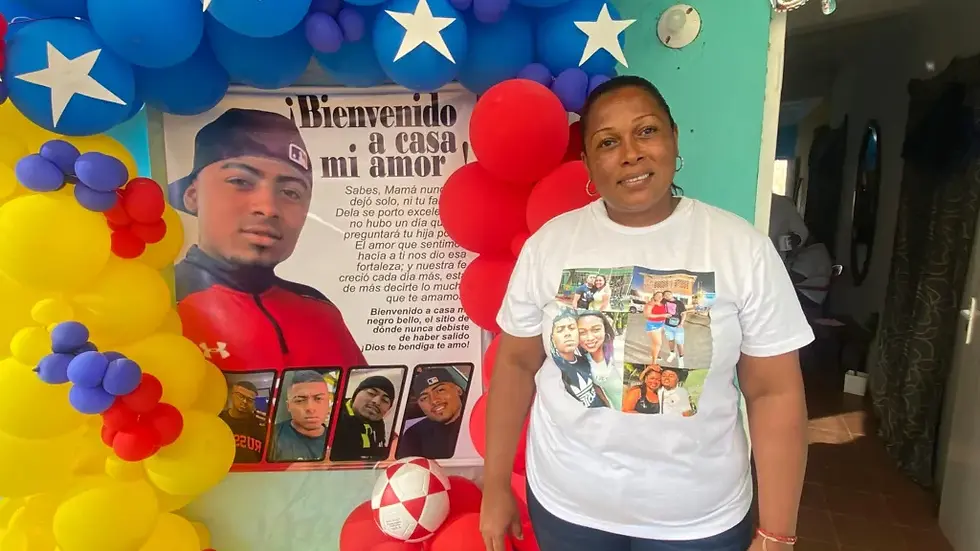 Edwuar Hernández Herrera was welcomed by his mother Yarelis, who had decorated the porch of her home. (Photo via Gustavo Ocando | BBC)