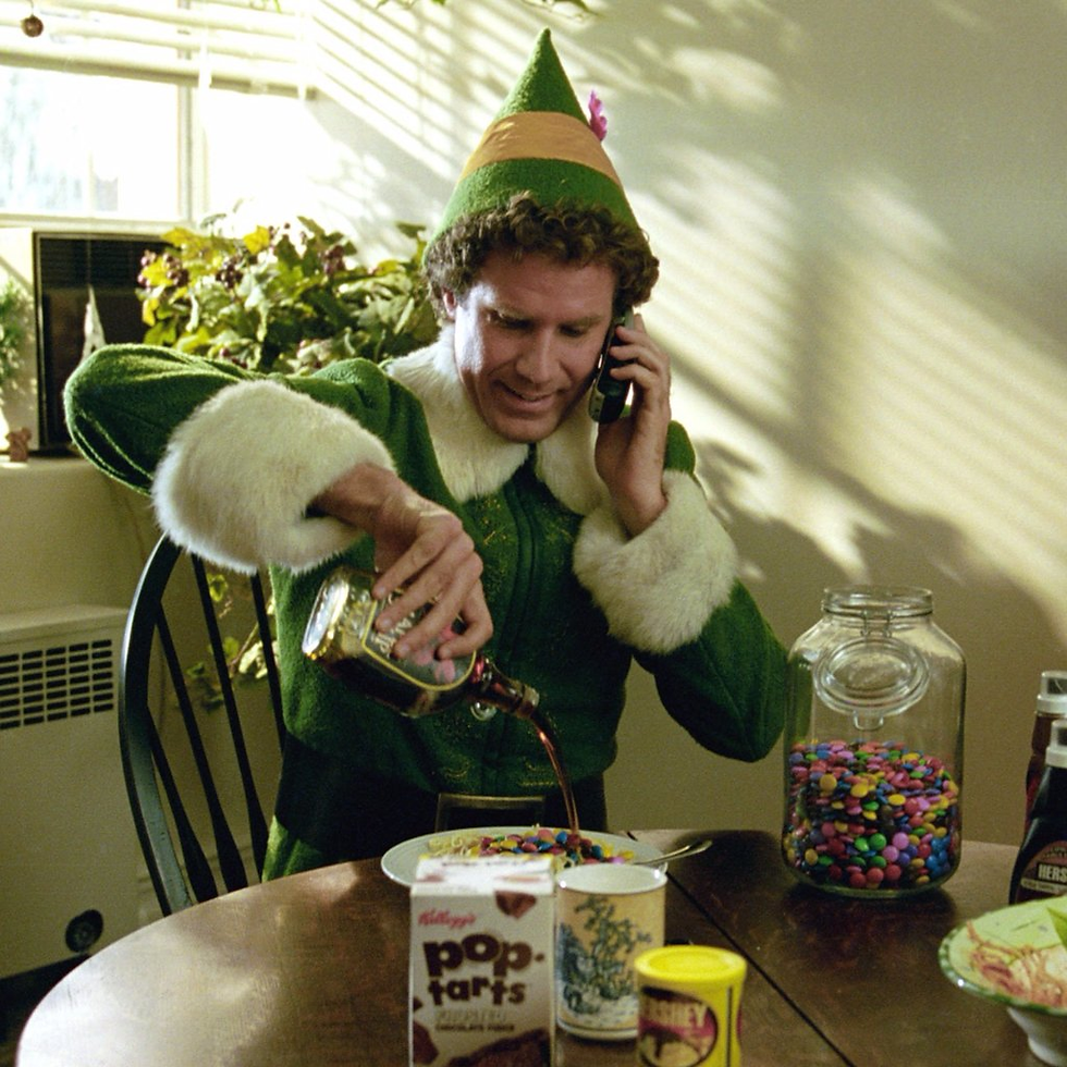 Buddy the Elf with his syrup