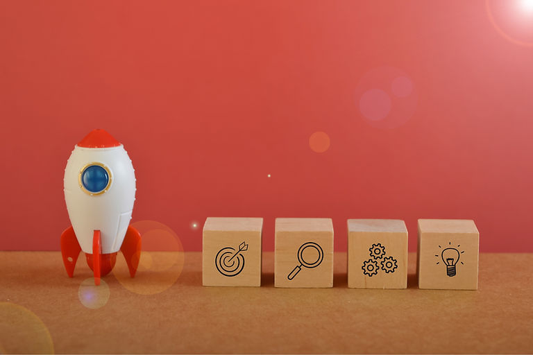 Toy rocket with target, analytics, strategy and innovation symbols..jpg