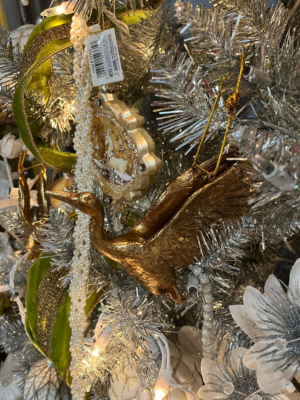 Thumbnail: Gold bird ornament
