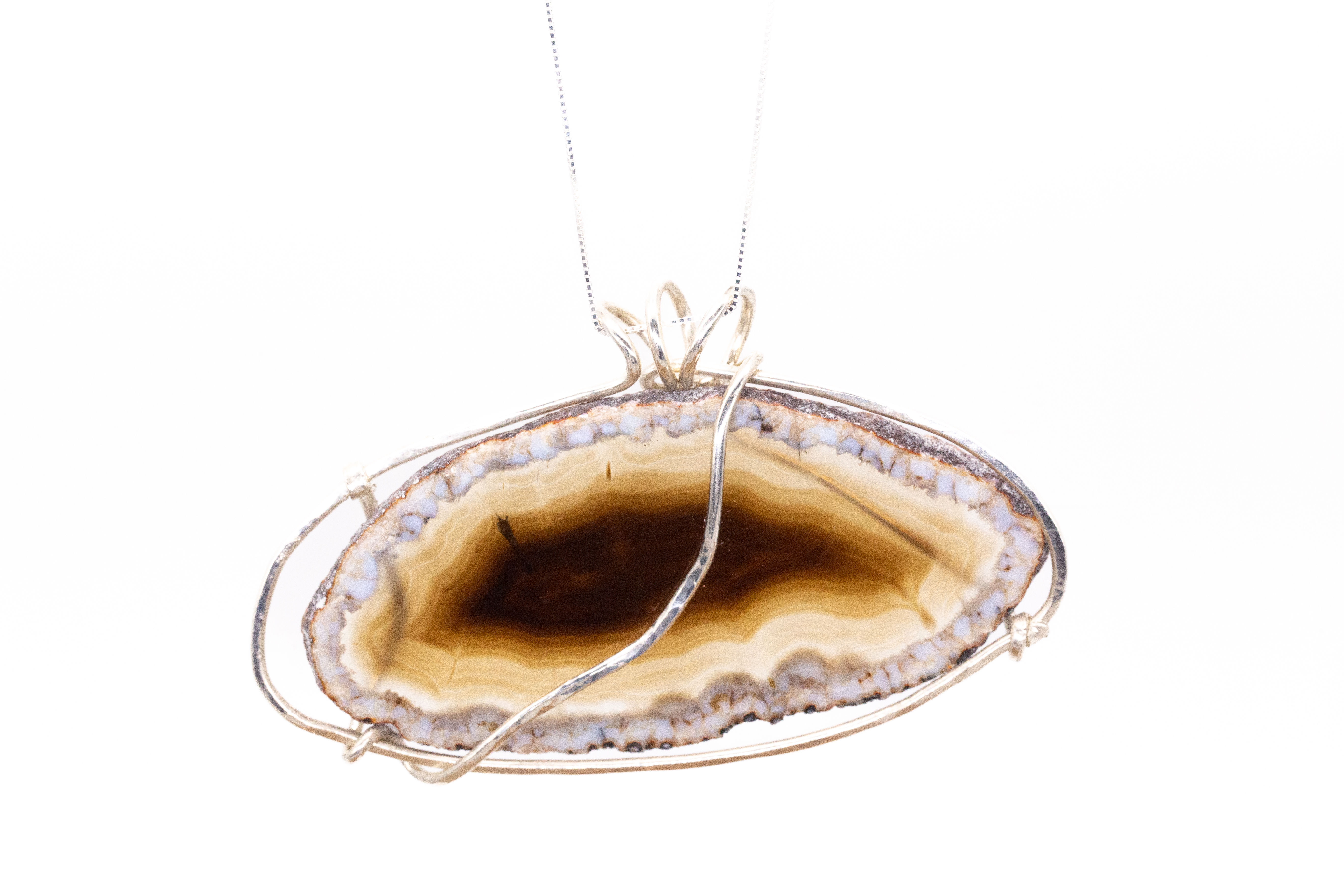 Double-sided Montana Agate Pendant. Hand Wrapped in Hammered Thick Gauge Sterling Silver.