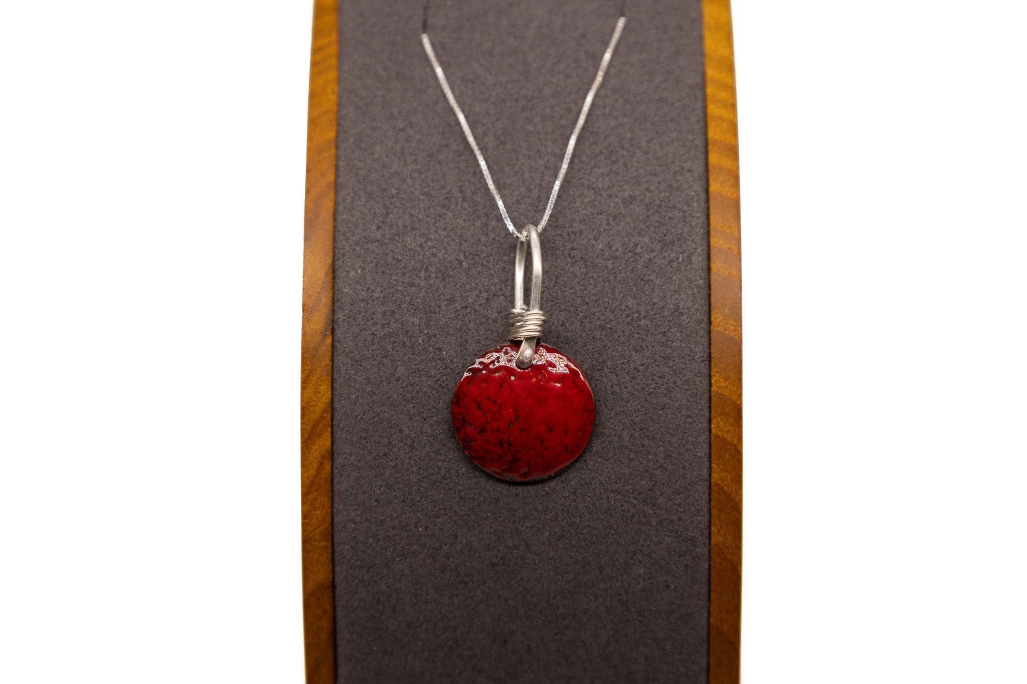 Chili red enameled pendant with sterling hand-formed bail.