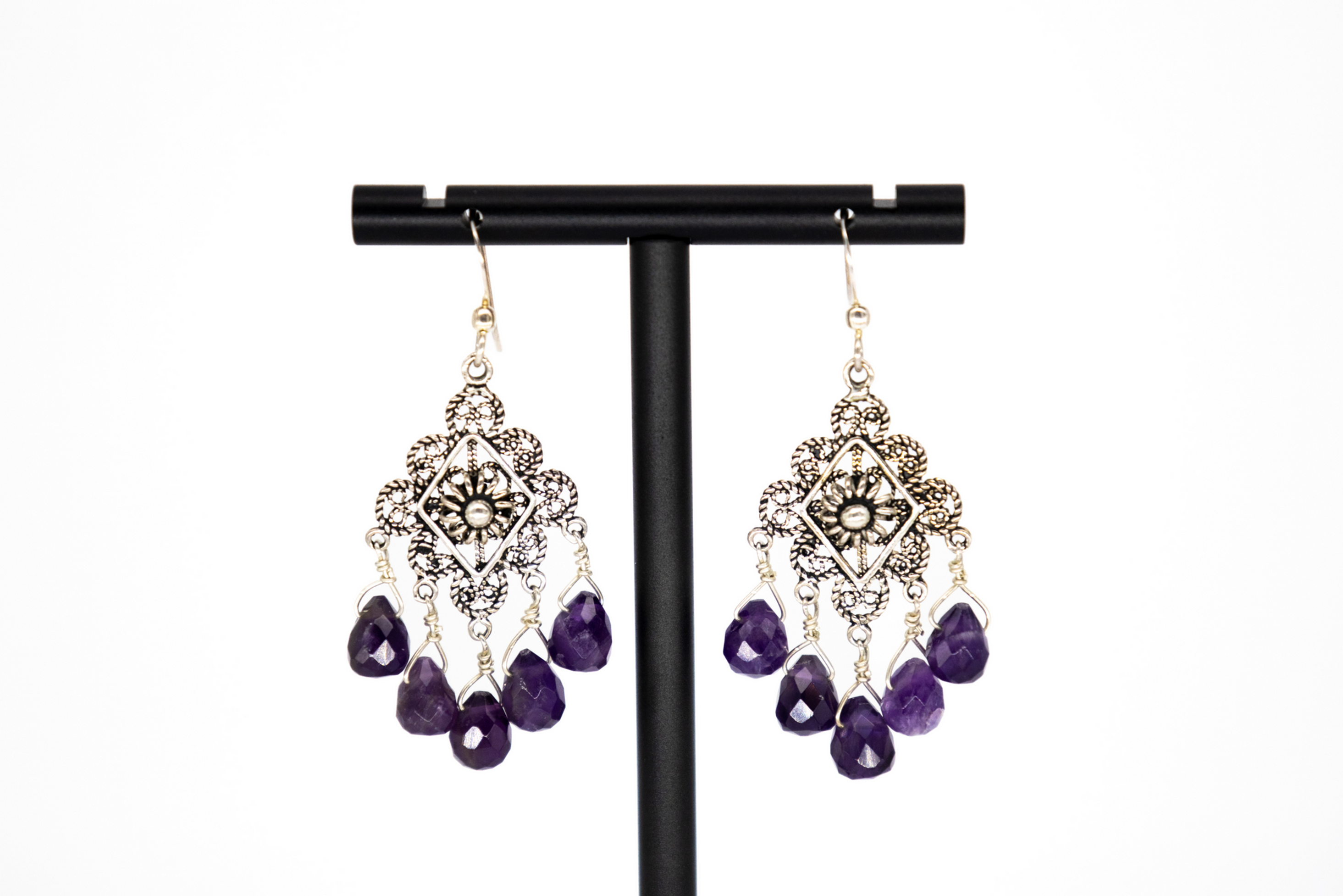 5 Drop Faceted Amethyst Briolettes on a Decorative Filigree Sterling Silver Frame.