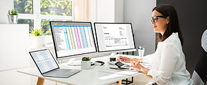 Online Taxes And Invoice Using Computer And Calculator.jpg