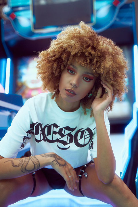 white, arcade, croptop, golden hair, curly,