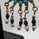 Thumbnail: Uzbek sun disc dangly silver earrings with stones