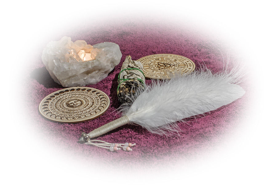 smudging feather and candle