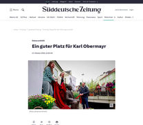 Ein guter Platz für Karl Obermayr Denkmal Stadt Freising, Bildhauerin Ioana Luca, Bronzestatue an der Moosach