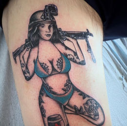 Traditional Army pin-up tattoo: Woman with rifle by Andrew Bouvia fiveanddimetattoos