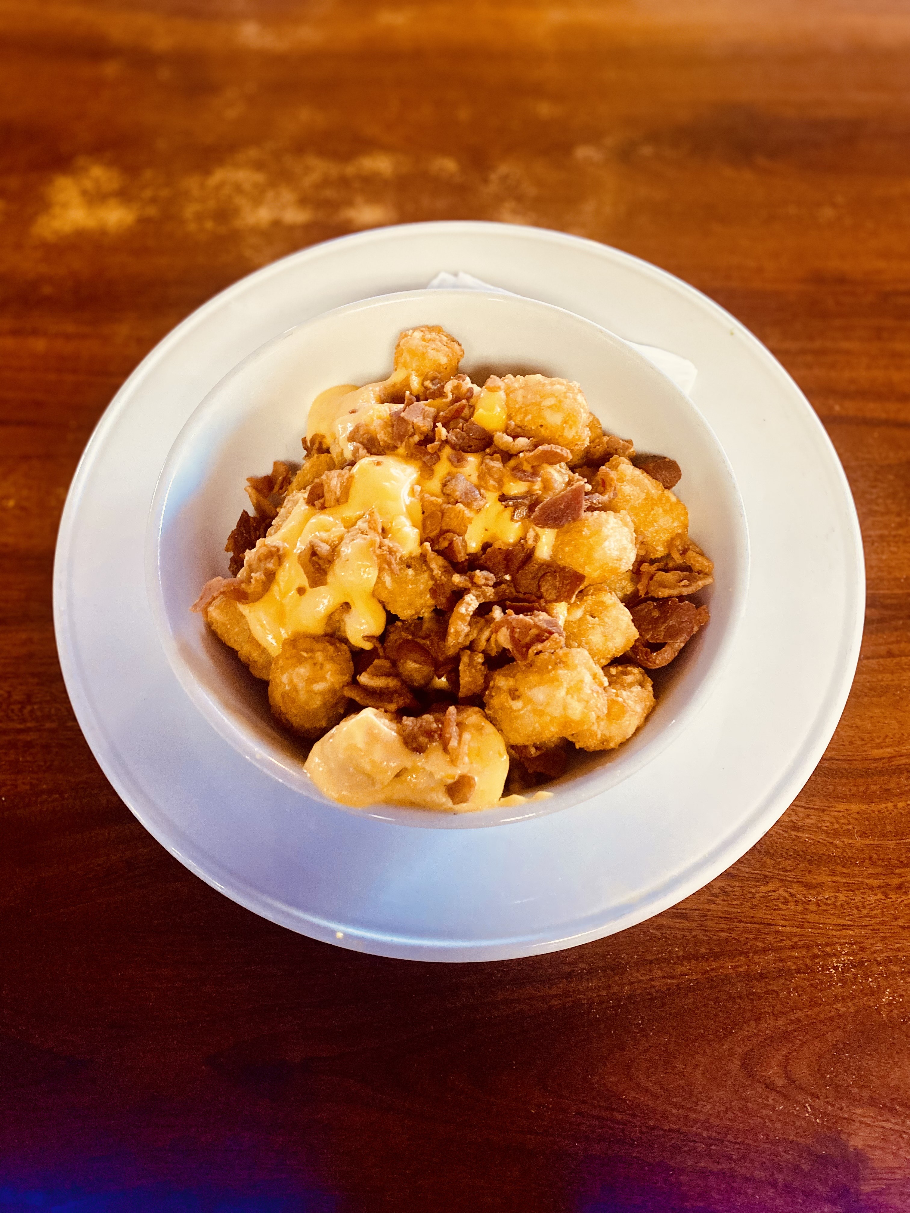 Goonie Tater Tots, Bacon & cheese Sauce.