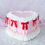 Thumbnail: Pink and Red Faux Heart Shaped Ruffle Lambeth Cake