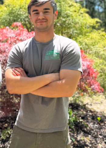 Woman using a tablet while sitting outdoors