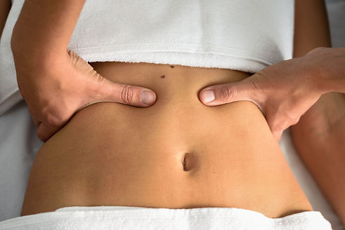 hands-massaging-female-abdomen-therapist-applying-2025-03-25-16-49-47-utc.jpg