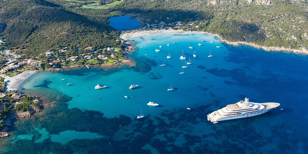 Luxury yacht charter cruising through the crystal-clear waters of the Mediterranean Sea