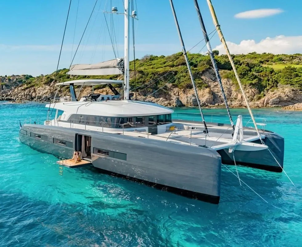 Modern sailing catamaran with full sails during a Mediterranean yacht charter