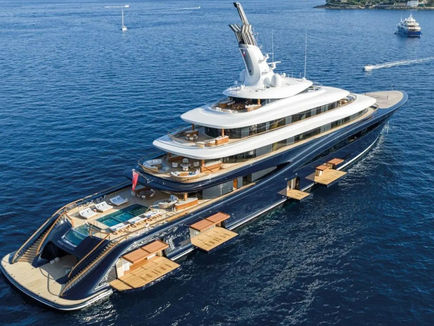 Luxury superyacht cruising through the Mediterranean during a private charter