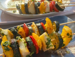 Halloumi and vegetable skewers in the golden sunlight