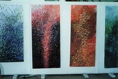 4 large drawings.  One is in reds, and black.  Another is in orange tones.  The other two are in blues and greens.  They are very textured and drawn with many layers of mark making that is little dashes of colour.